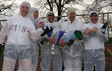 The team Tom Downes, Elliot Kidner, Alex Joslin, Simon Salter and Mark Finding and carrying Kath Joslin