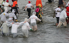 The team wading through the water